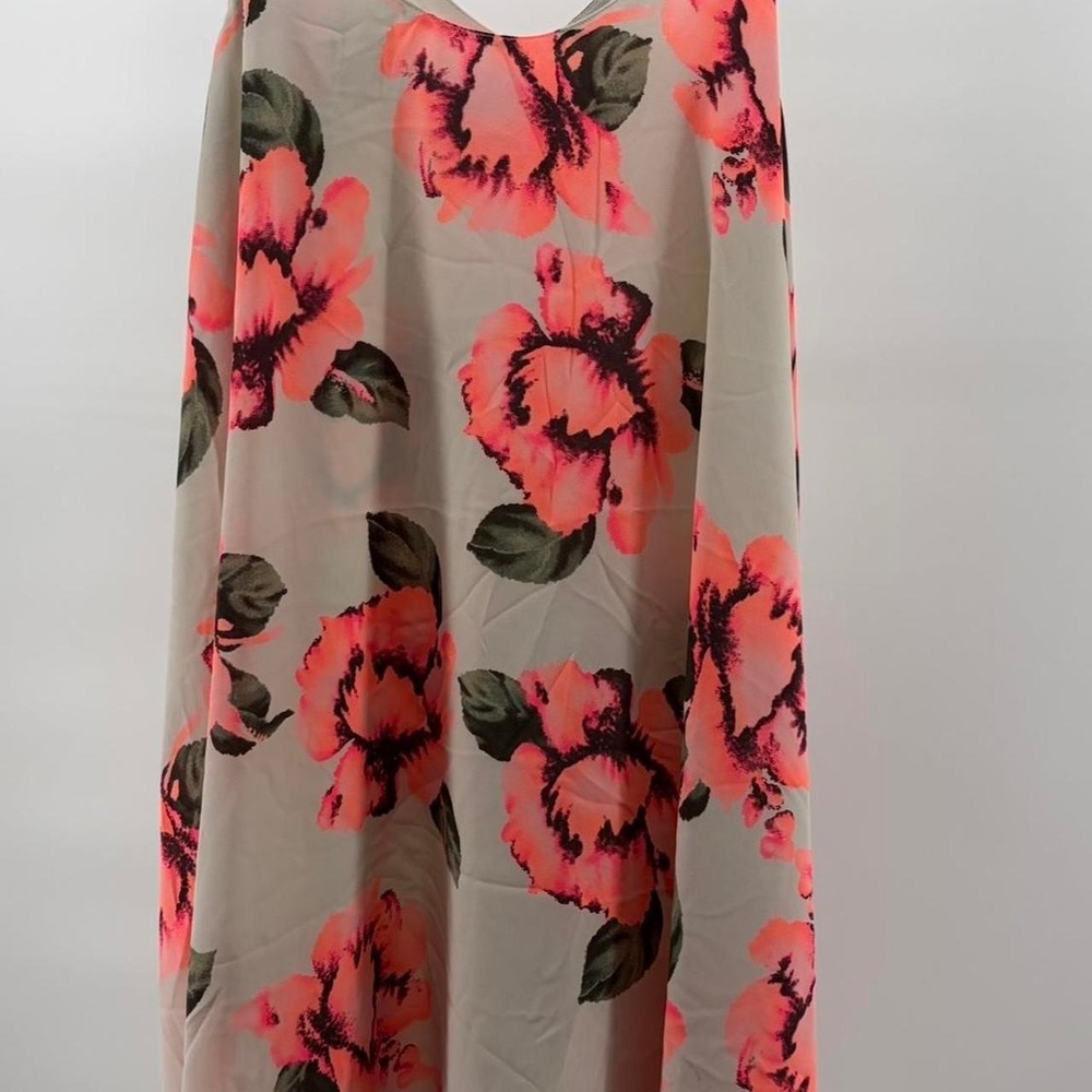 Pink and white floral midi dress with V-neckline and sleeveless design